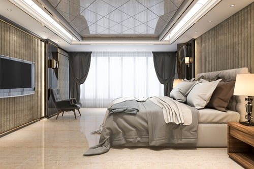 Bright bedroom with tailored window treatments filtering Florida daylight